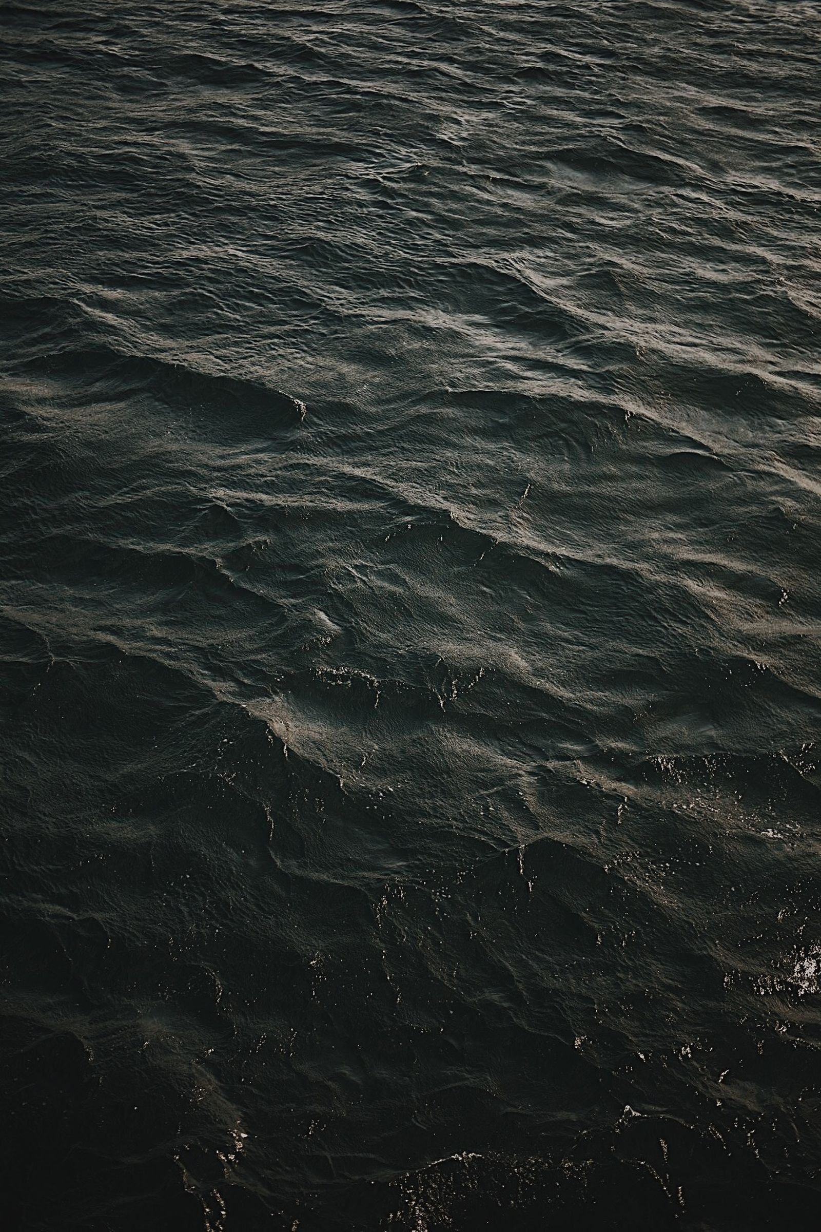 Dark ocean surface seen from above