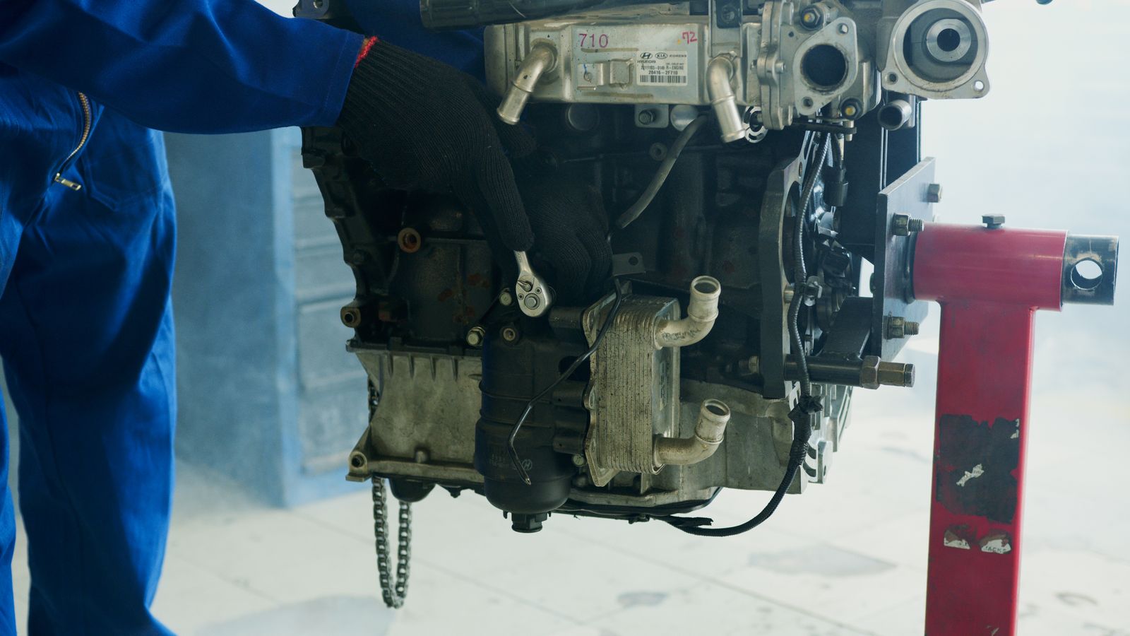 Technician working on a marine engine
